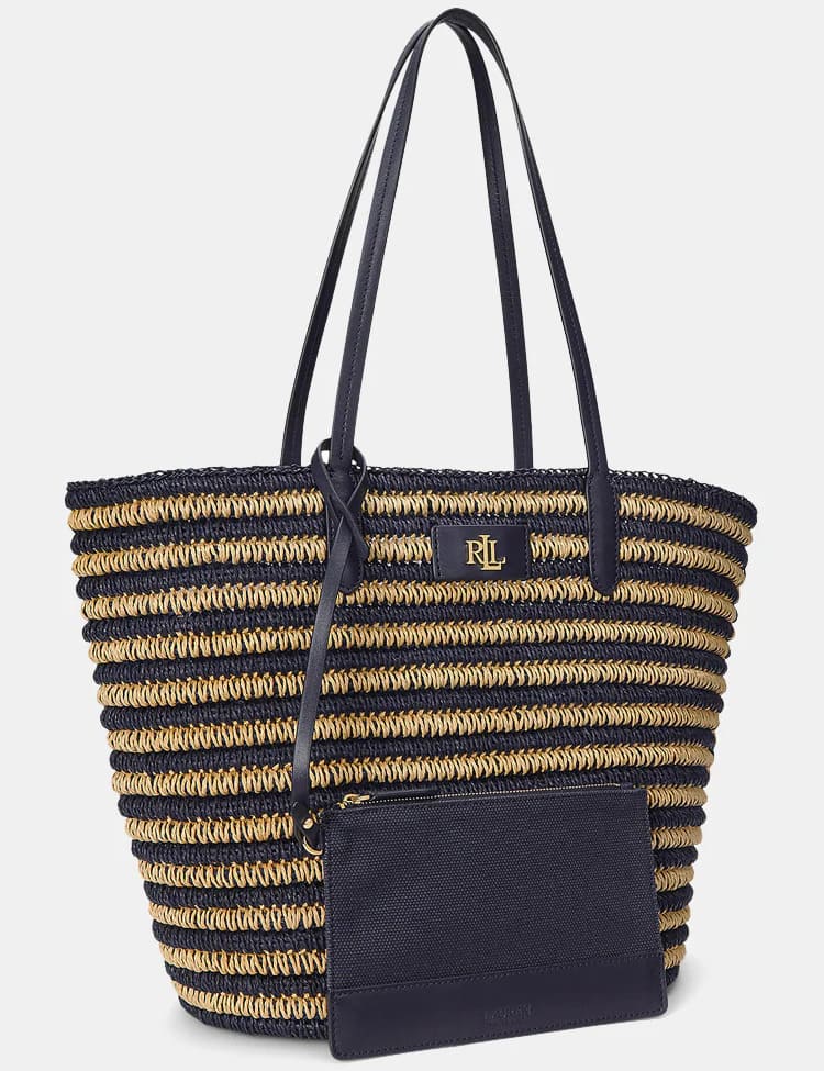 El bolso tote para mujer Brie grande de rafia a rayas en color azul marino de Ralph Lauren en El Corte Inglés