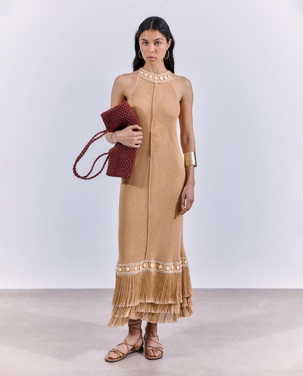 Vestido con flecos, Sfera