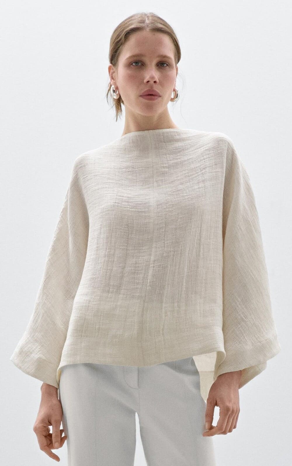 Camisa escote pico espalda – Studio