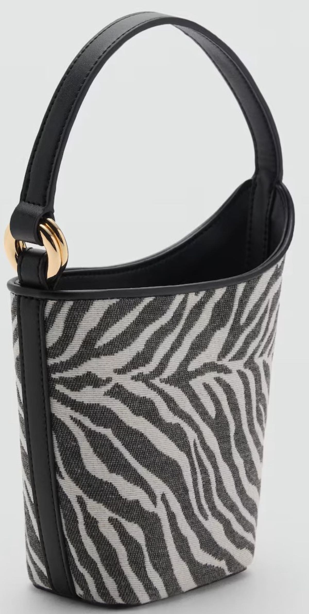 Bolso bucket estampado cebra de Mango