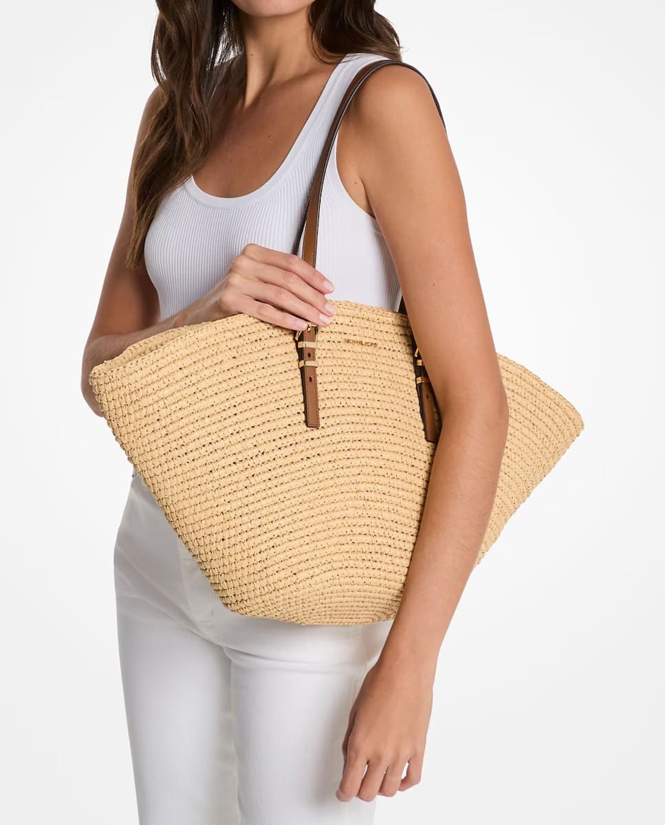 El bolso de hombro tote Isa tejido en color marrón de Michael Kors en El Corte Inglés