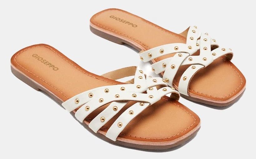 Sandalias mule de piel con tiras y tachas decorativas