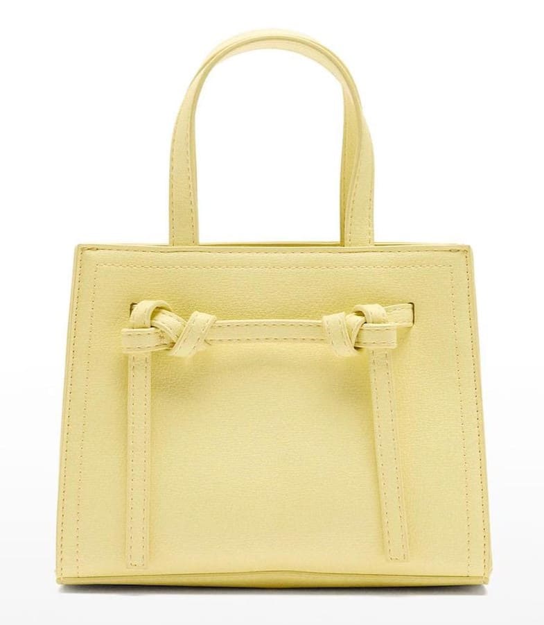 Bolso de mano estilo tote convertible a bandolera con cierre de cremallera en liso