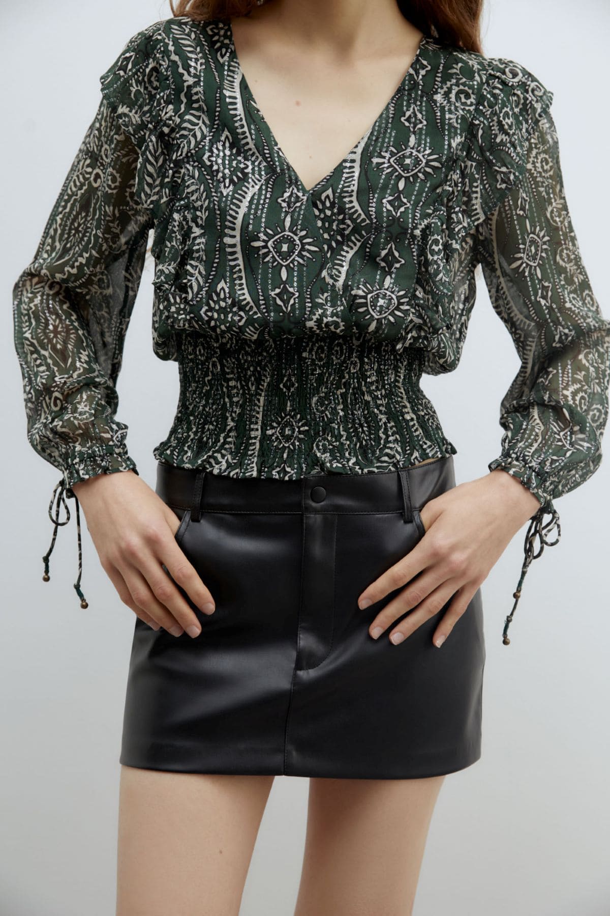 Blusa con volante de Sfera