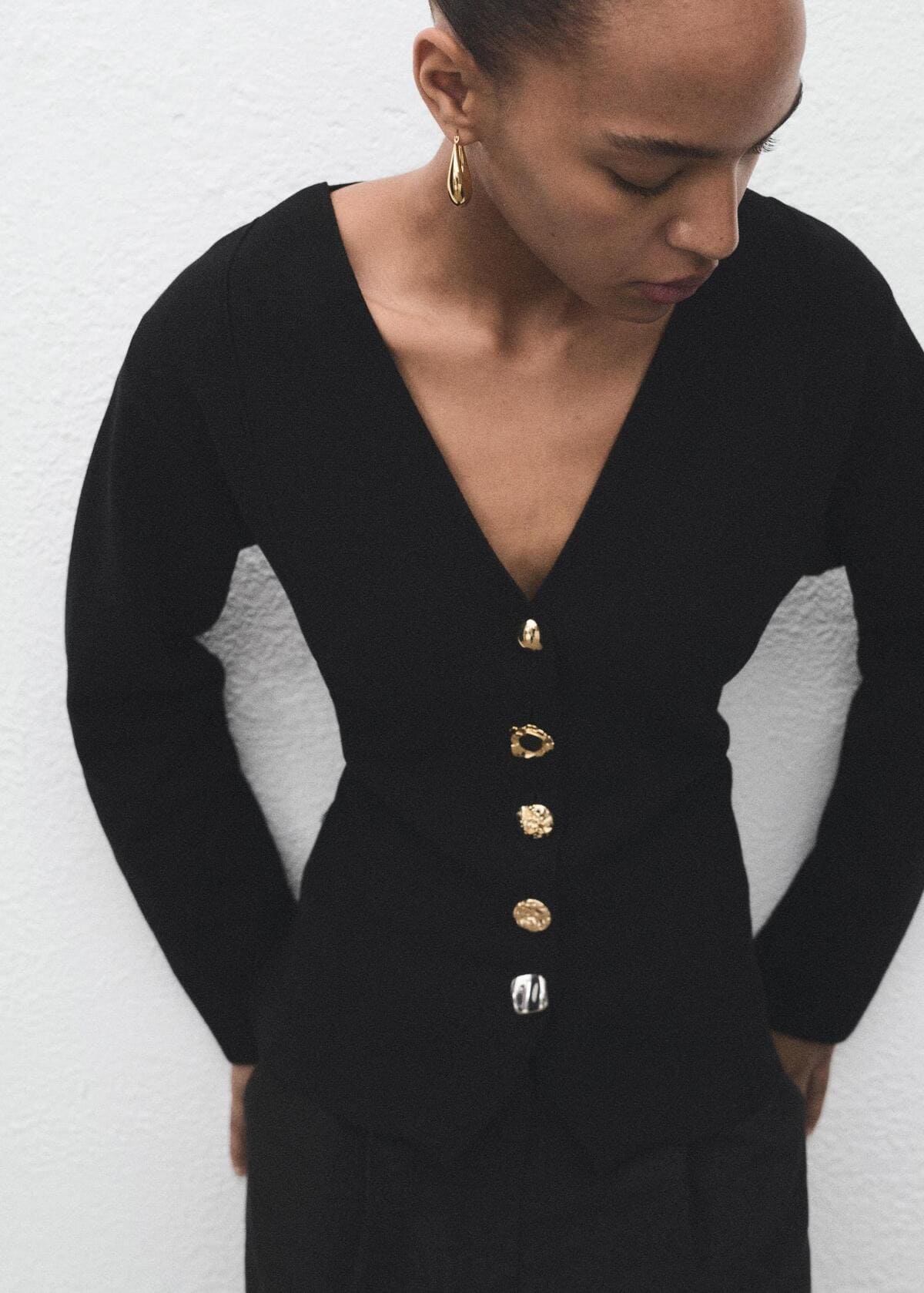 Chaqueta de punto con botones joya