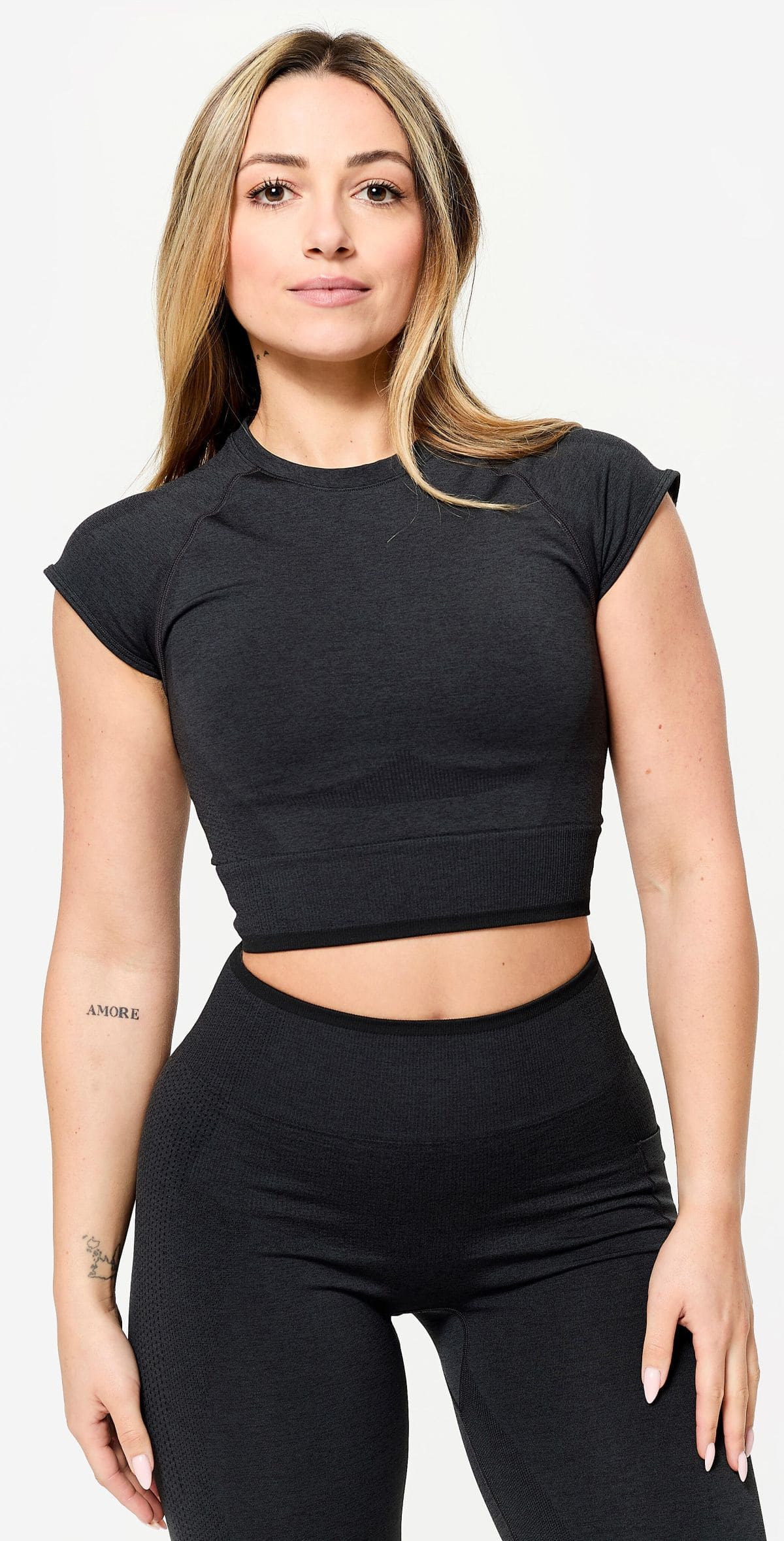 Camiseta crop top sin costuras Domyos de Decathlon