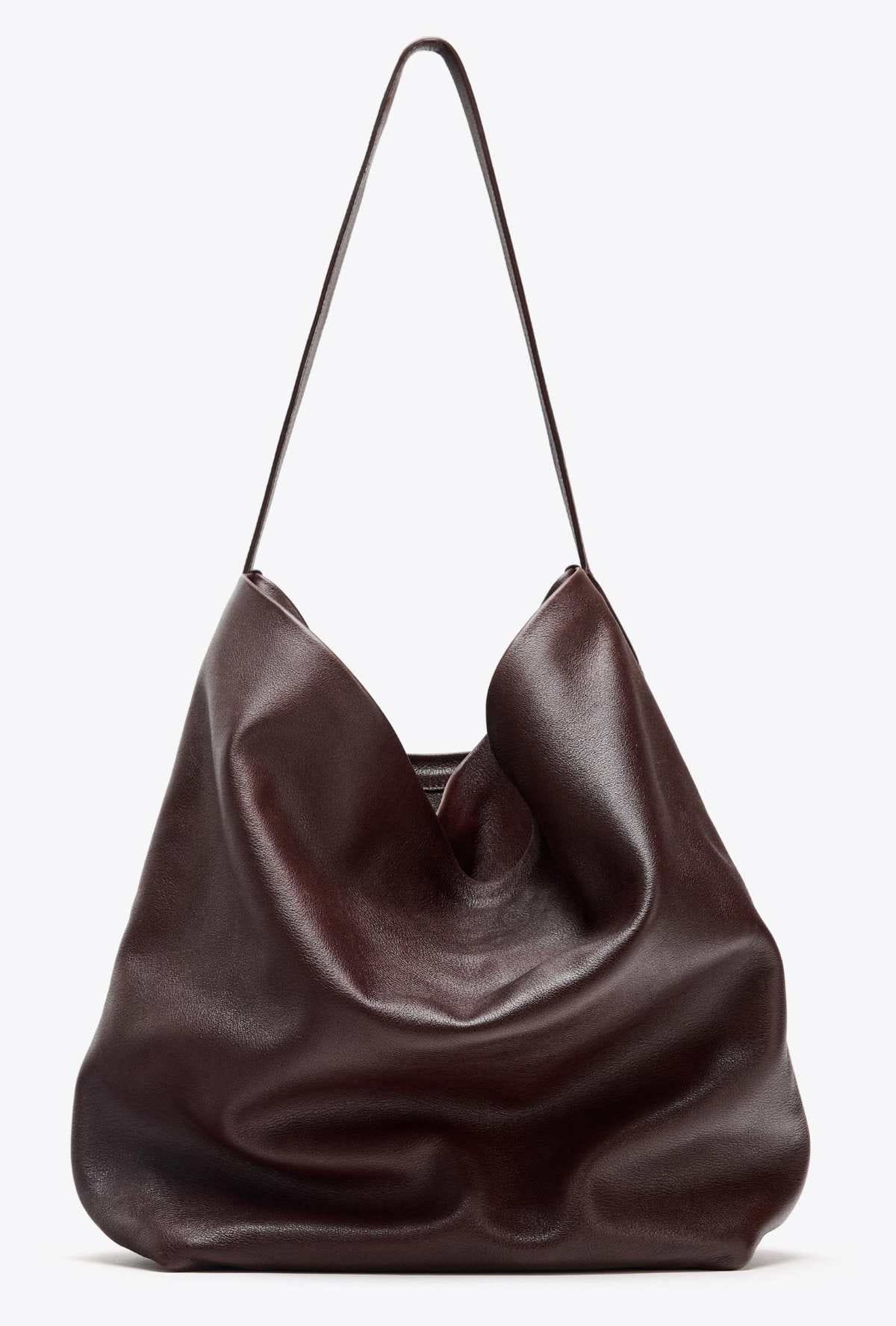 Saca piel doble compartimento de Zara