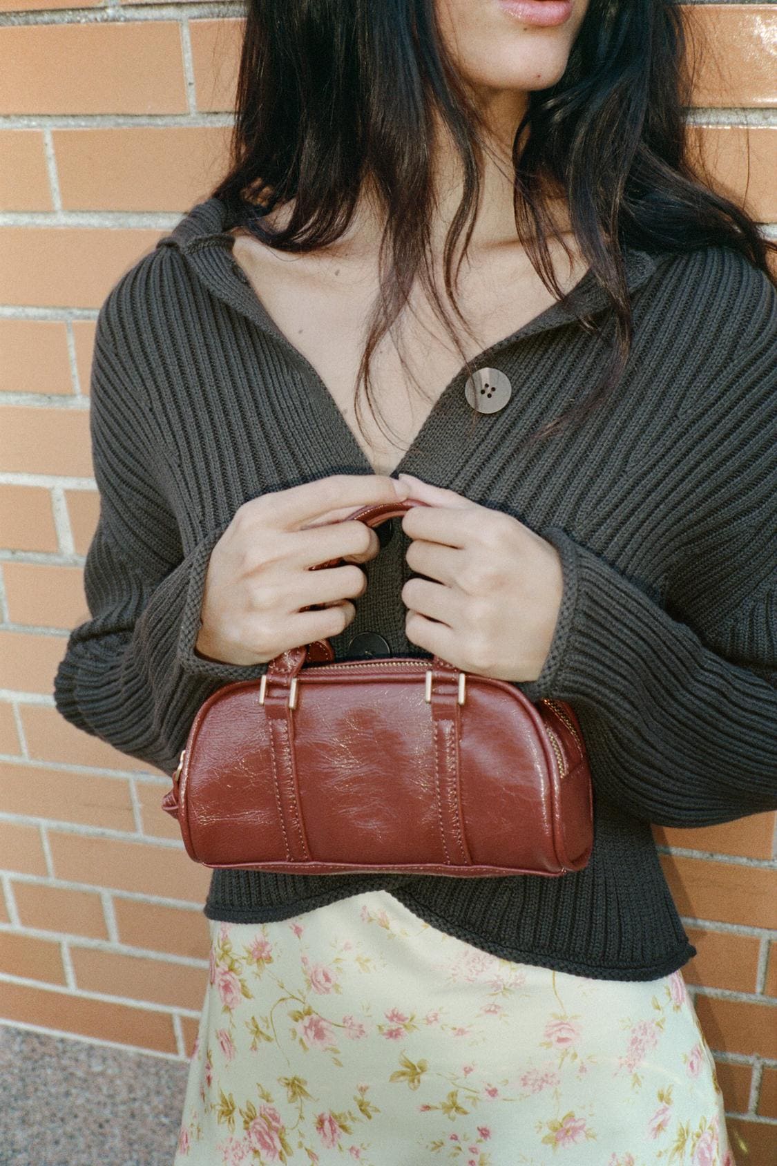 El mini bolso bowling en color naranja de Zara