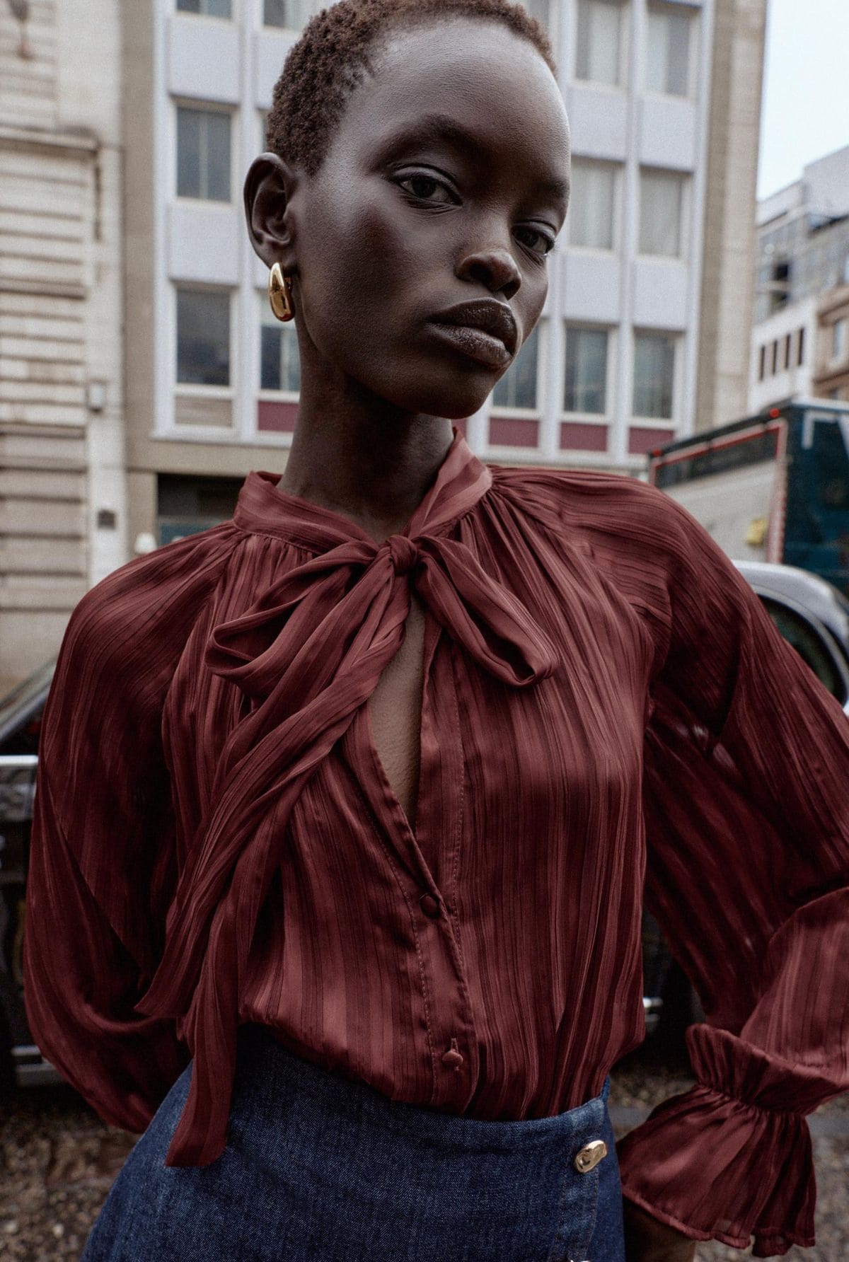 Blusa con rayas y lazada de Zara