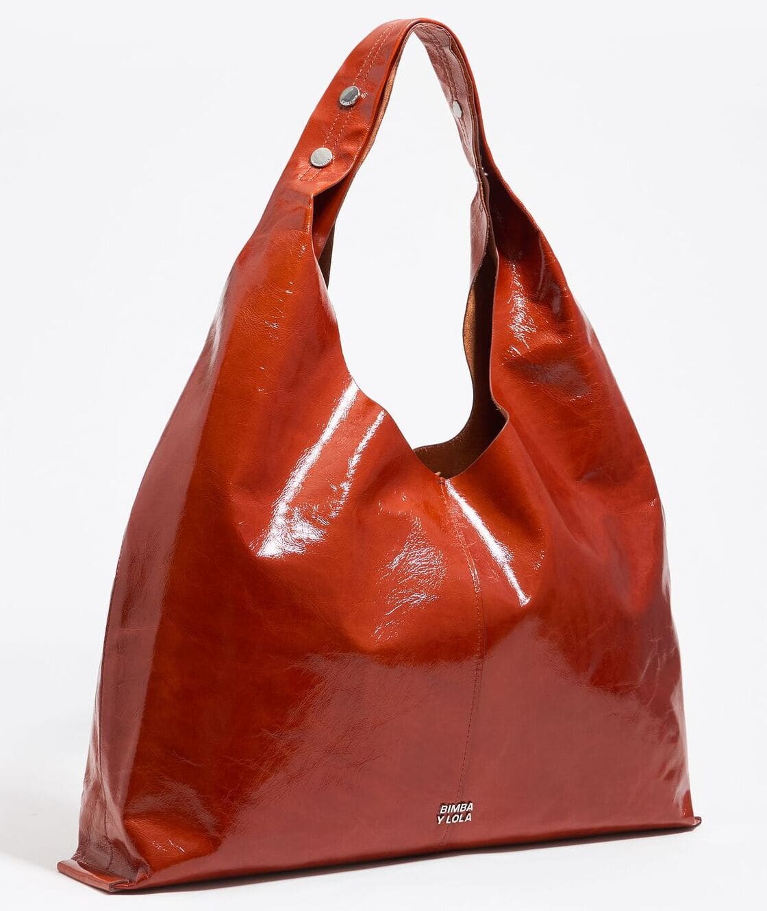 El bolso paper bikini maxi de piel en color naranja quemado de Bimba y Lola