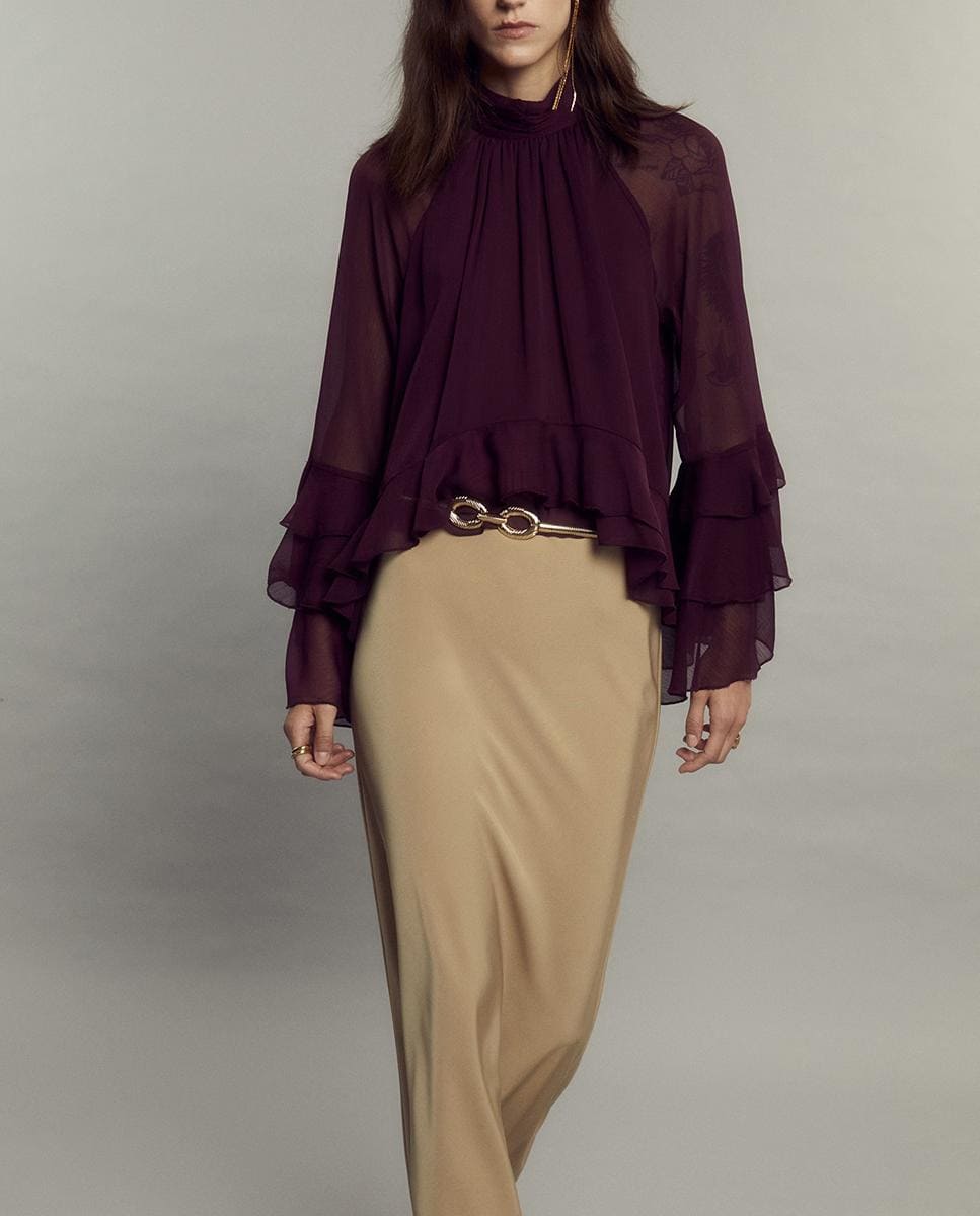 Top de manga con volantes, Sfera