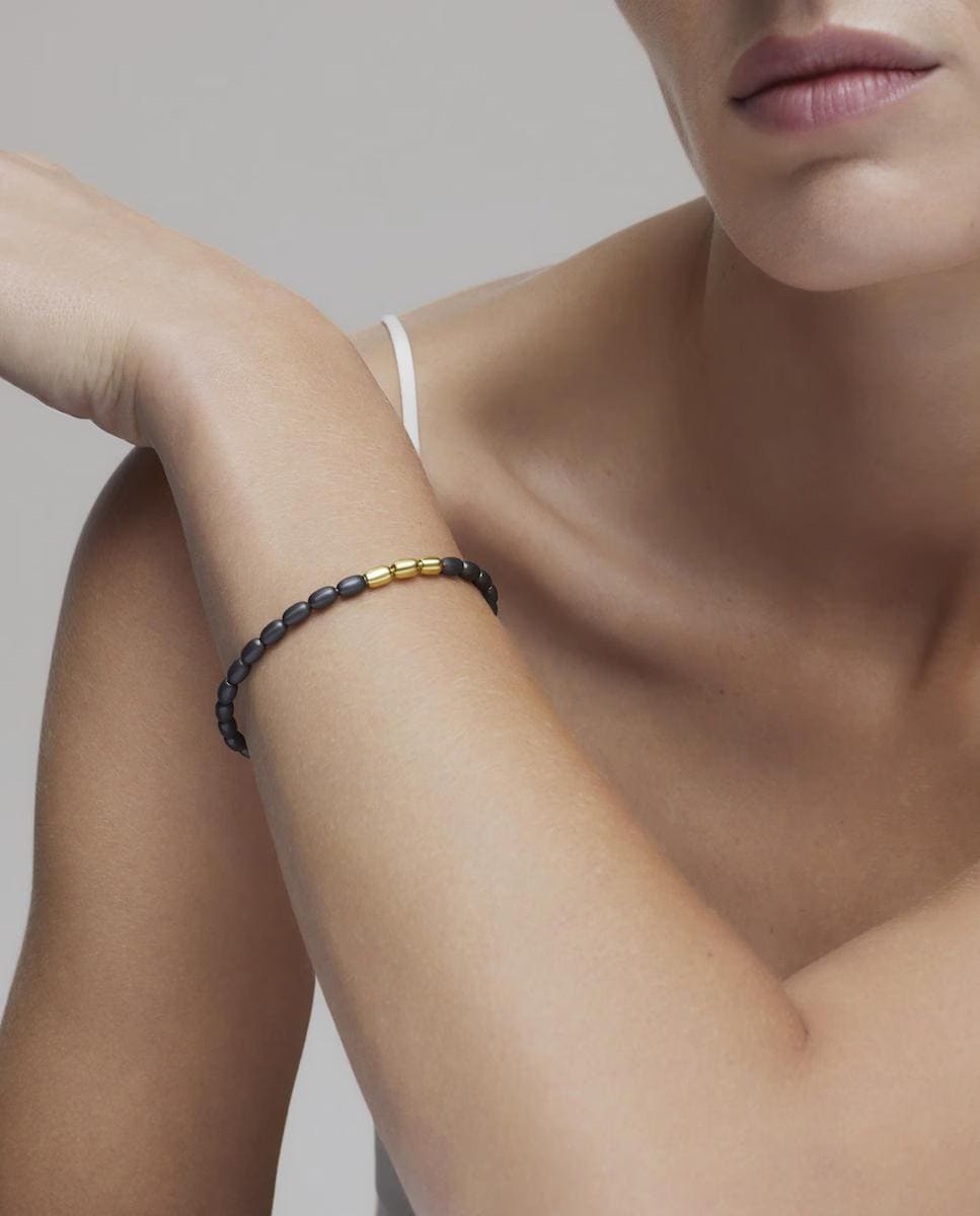 Pulsera ATELIER elástica de titanio y oro