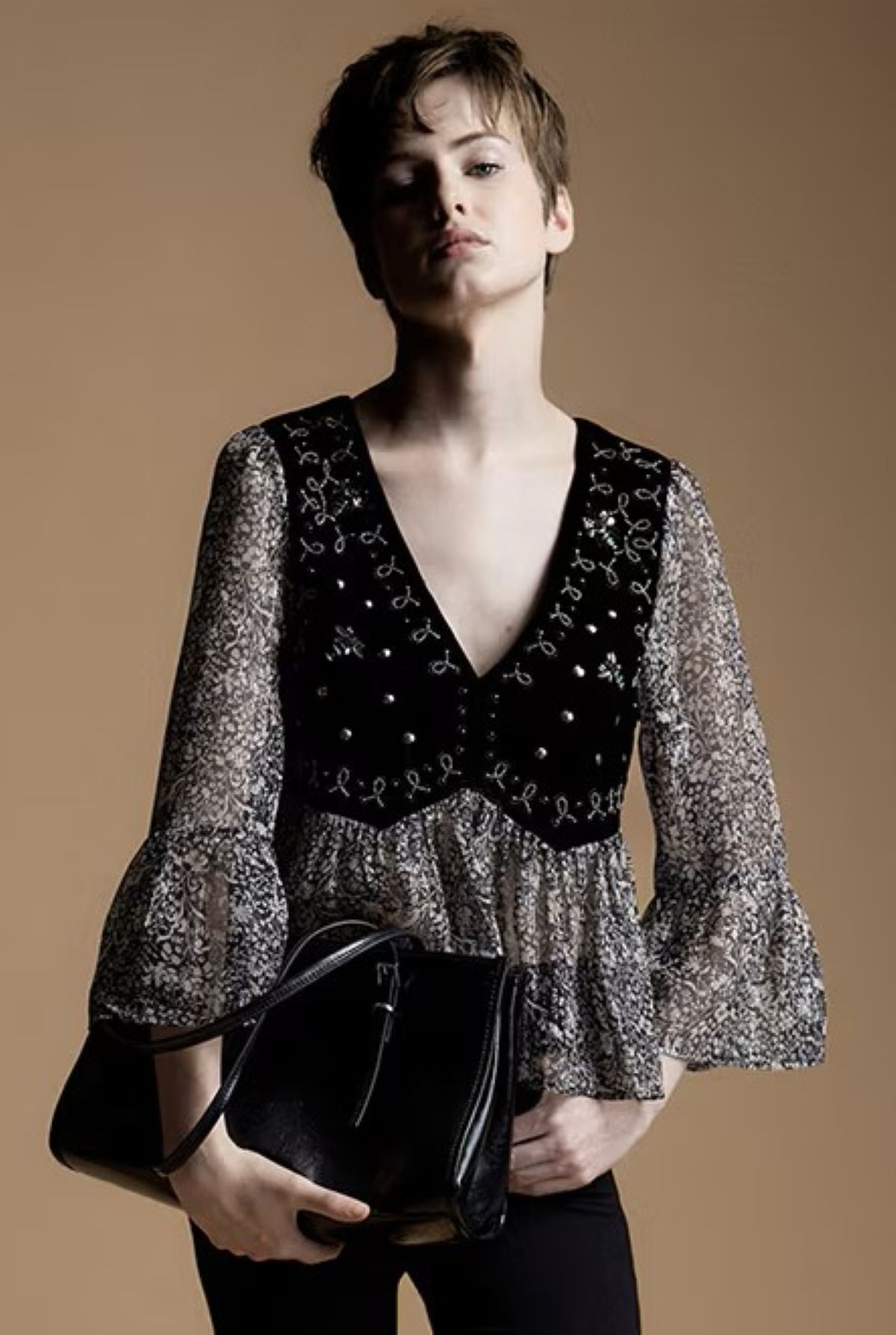 Blusa lurex combinada de Sfera