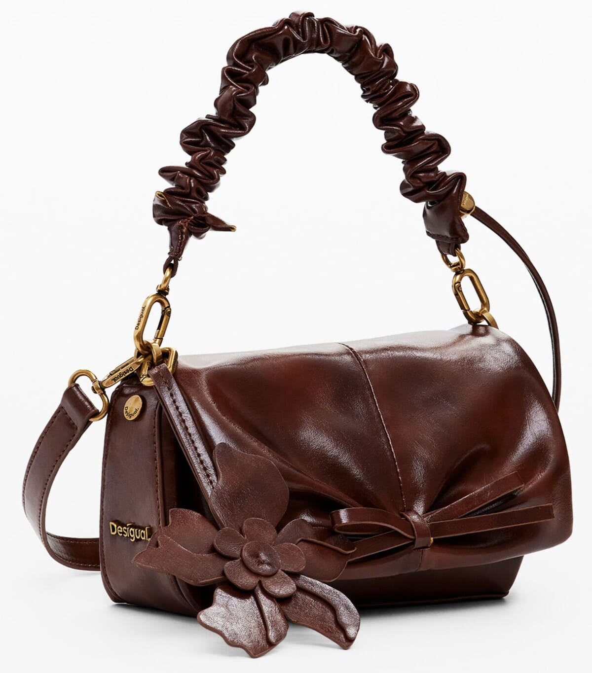 Bolso pequeño brillante con detalle de flor