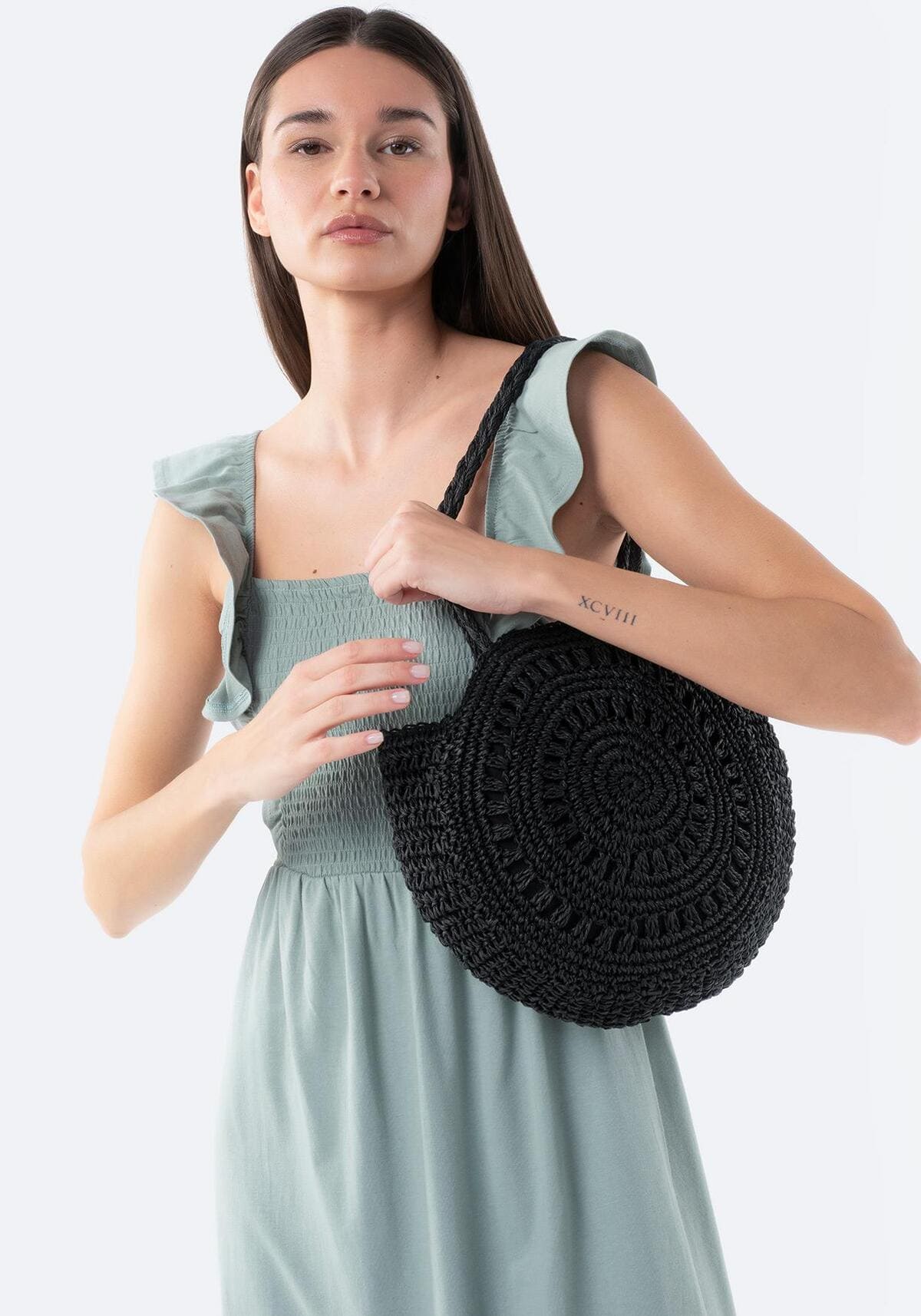 Bolso redondo con asas de papel