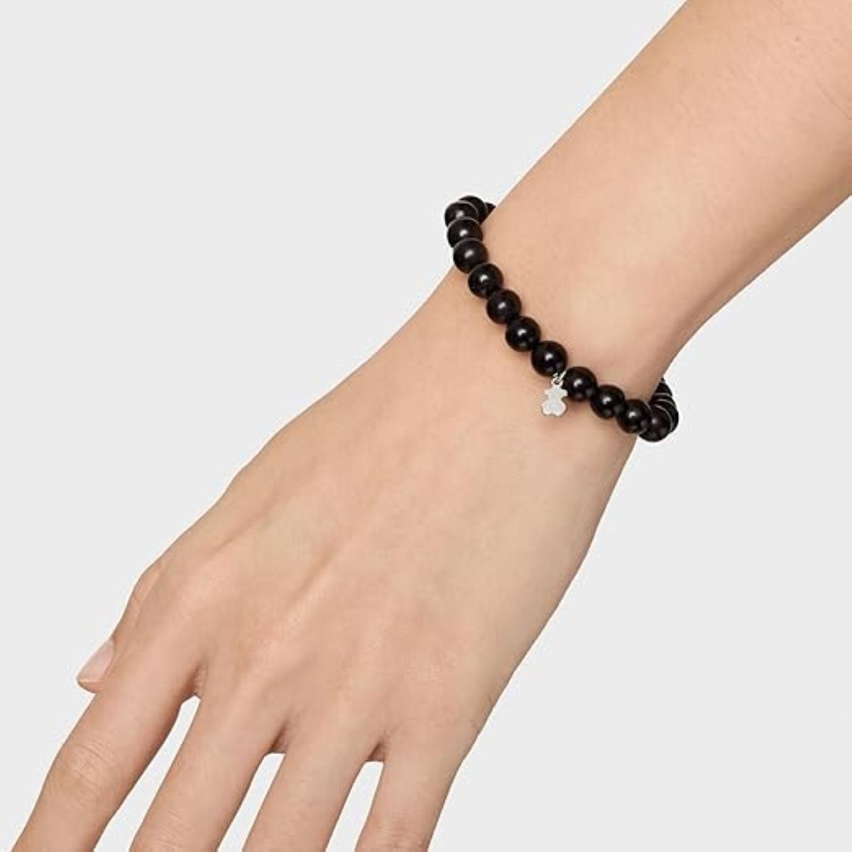 Pulsera elástica negra de azabache con motivo de oso en plata de primera ley Tous de Amazon