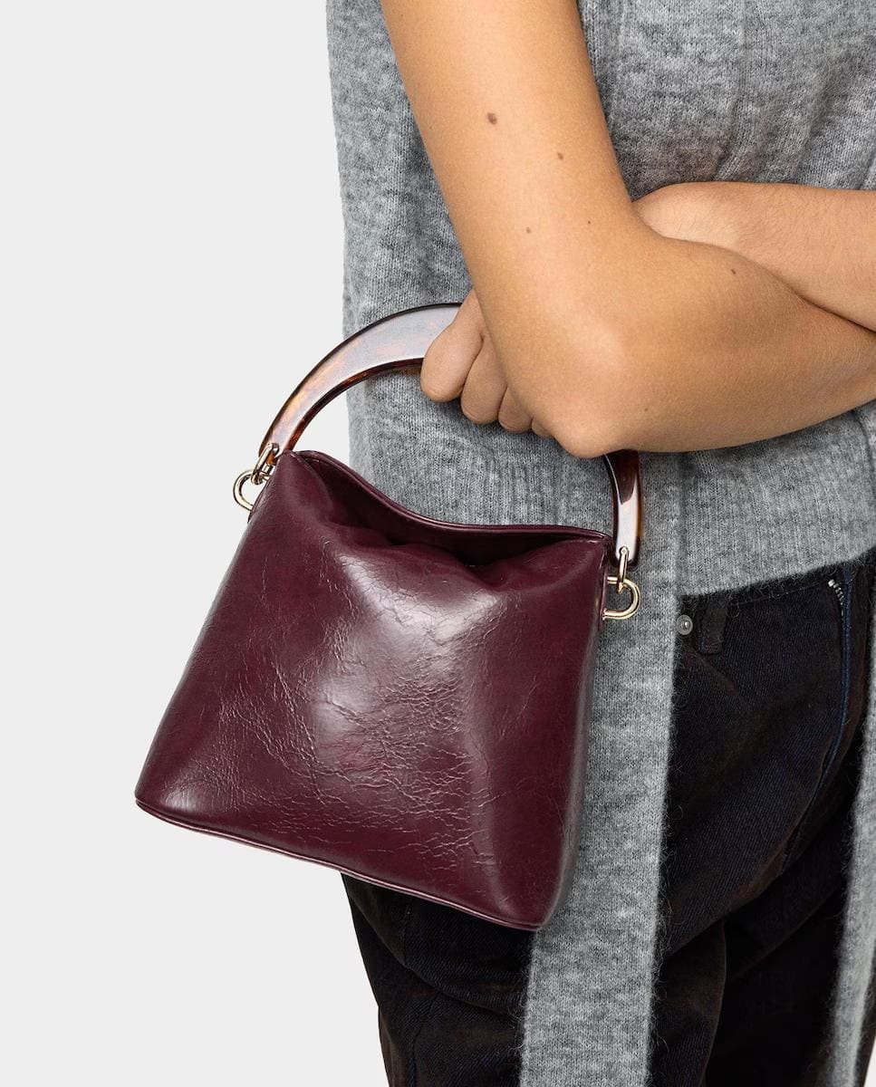 Bolso de fiesta multiposición con cierre imantado y asa rígida