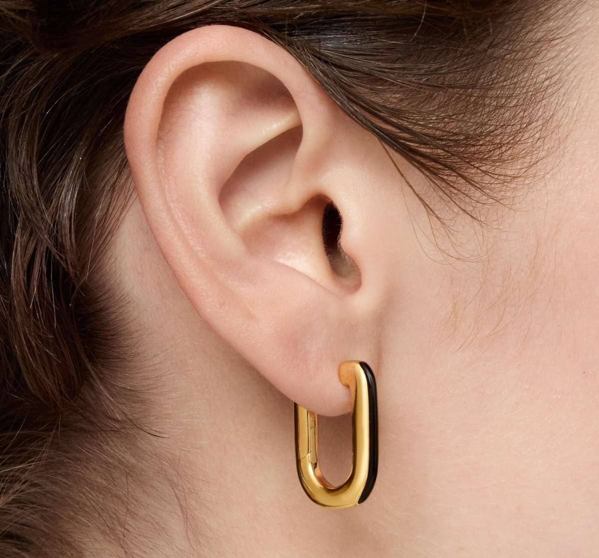 Pendientes de aro con baño de oro 18 kt sobre plata y ónix Line de TOUS