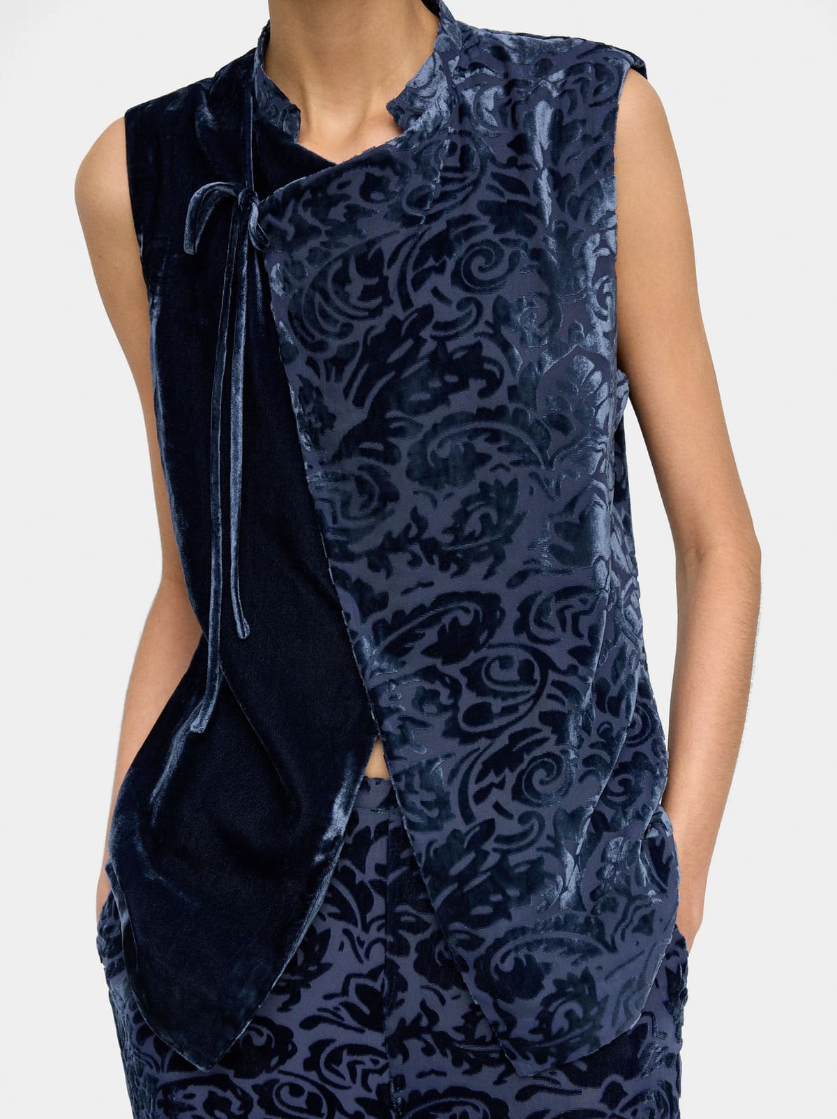 Top jacquard con cruzado