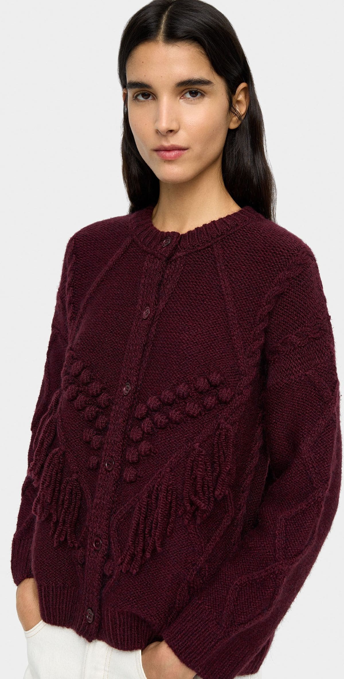 Jersey de punto con flecos y relieves de Parfois