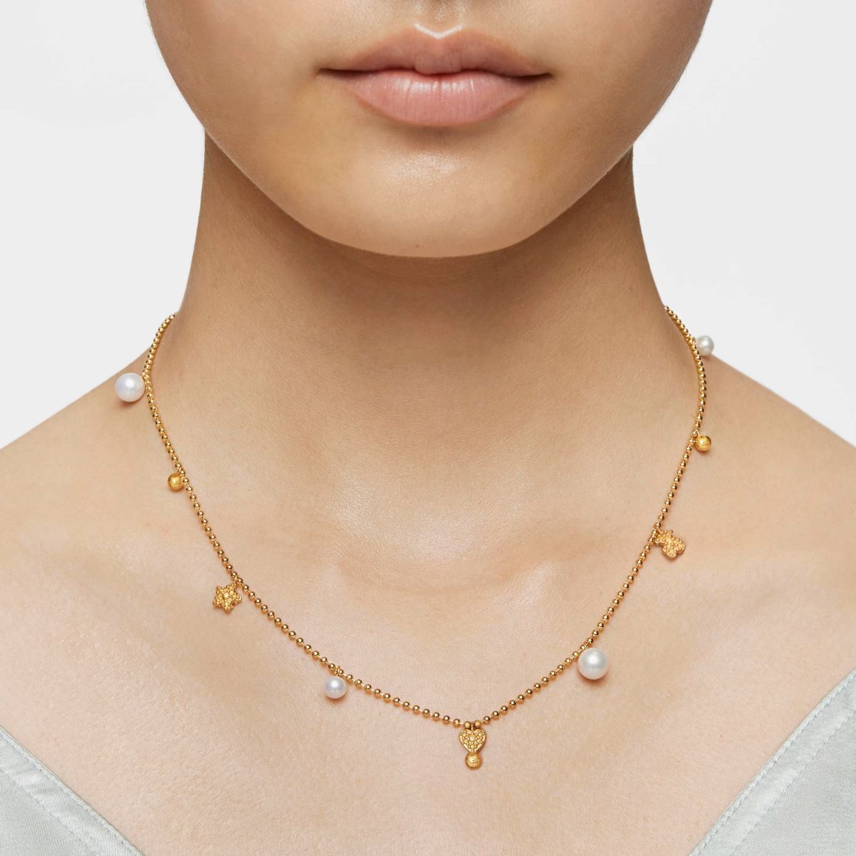 Collar corto con baño de oro de 18 kt sobre plata, perlas cultivadas y motivos TOUS Grain