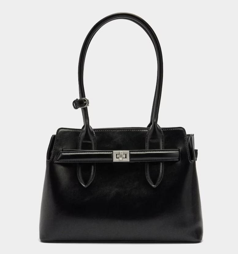 Bolso de mano estilo tote con detalle de cinturón y cierre a presión en liso