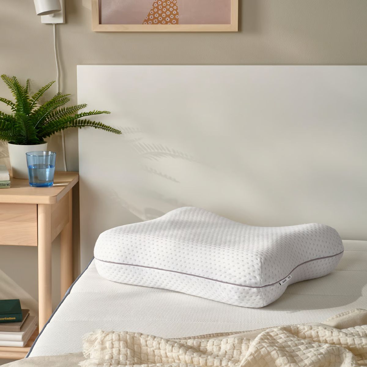 Almohada ergonómica multiposición de la serie ISRANUNKEL de Ikea