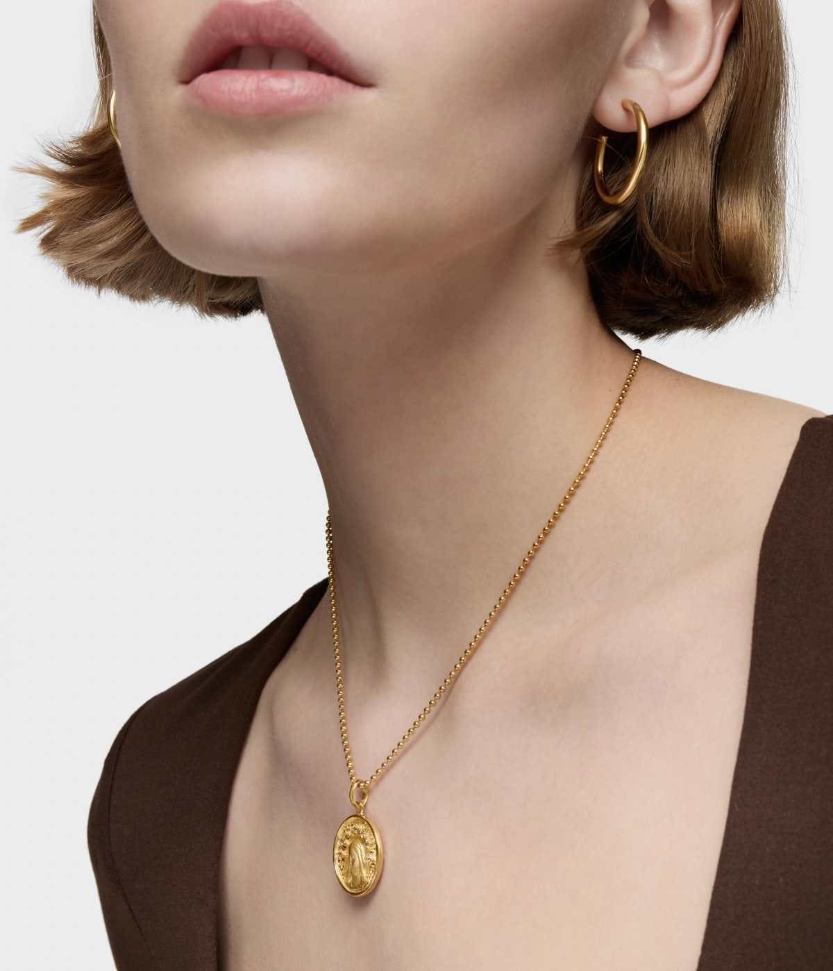 Medalla pequeña con baño de oro 18 kt sobre plata y topacio Tamara Falcó X TOUS