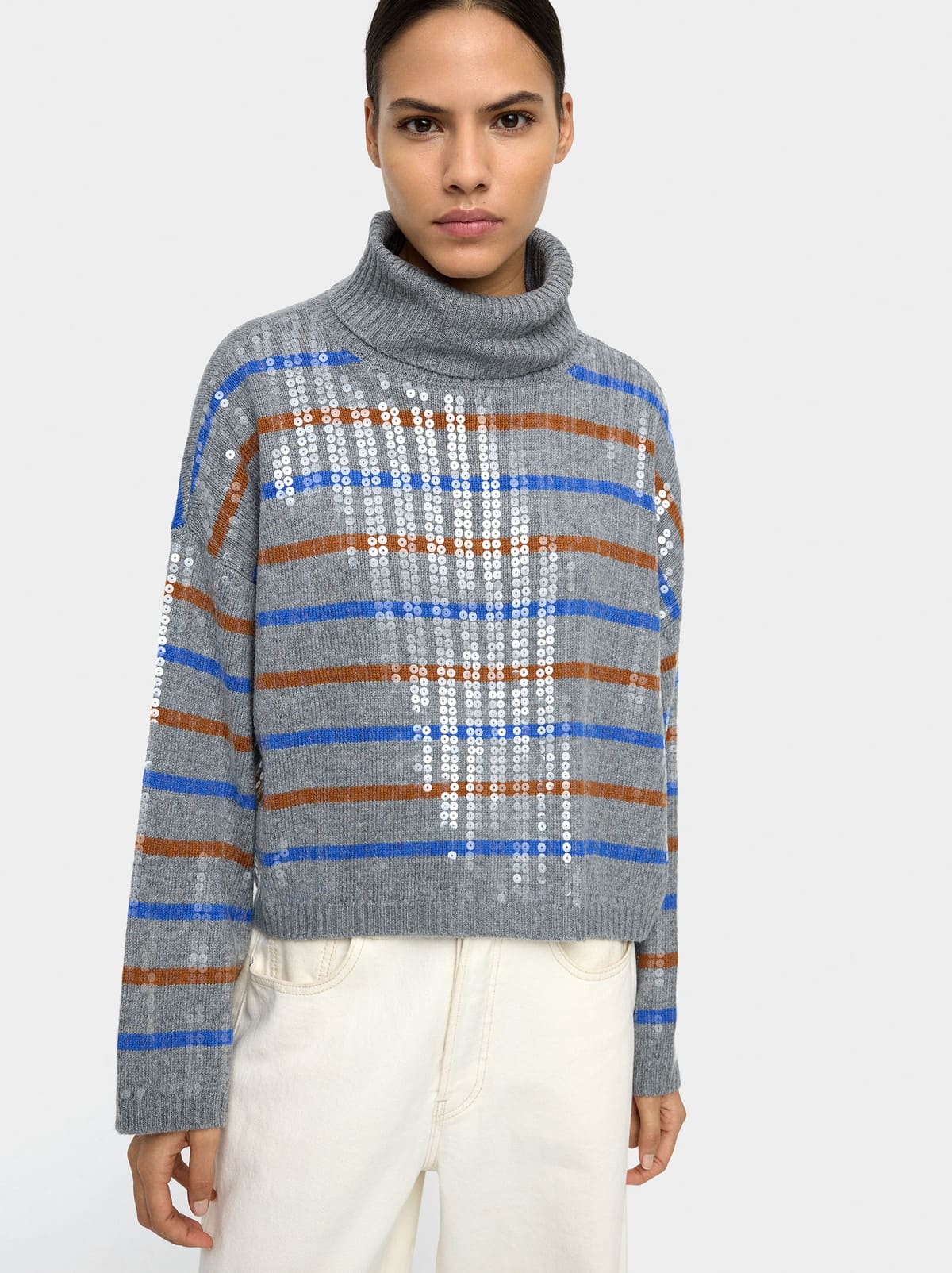 Jersey de punto a rayas con lentejuelas