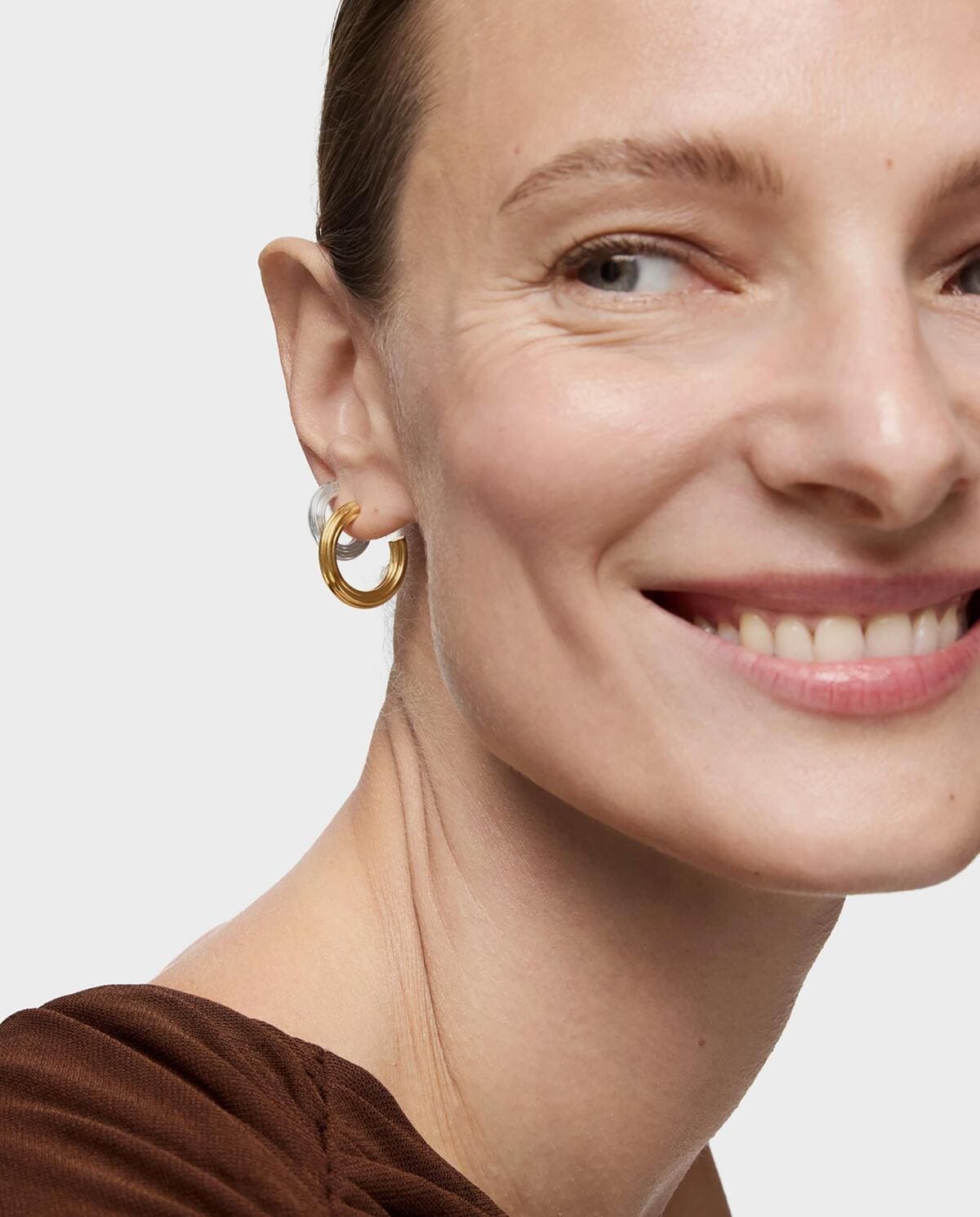 Pendientes TOUS 1950 de aro bañados en oro 18 kt sobre plata con flor