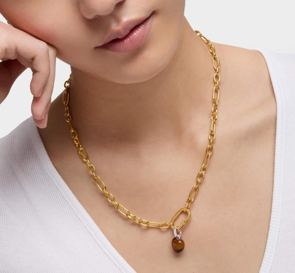 Colgante de plata y ojo de tigre TOUS Flechazo