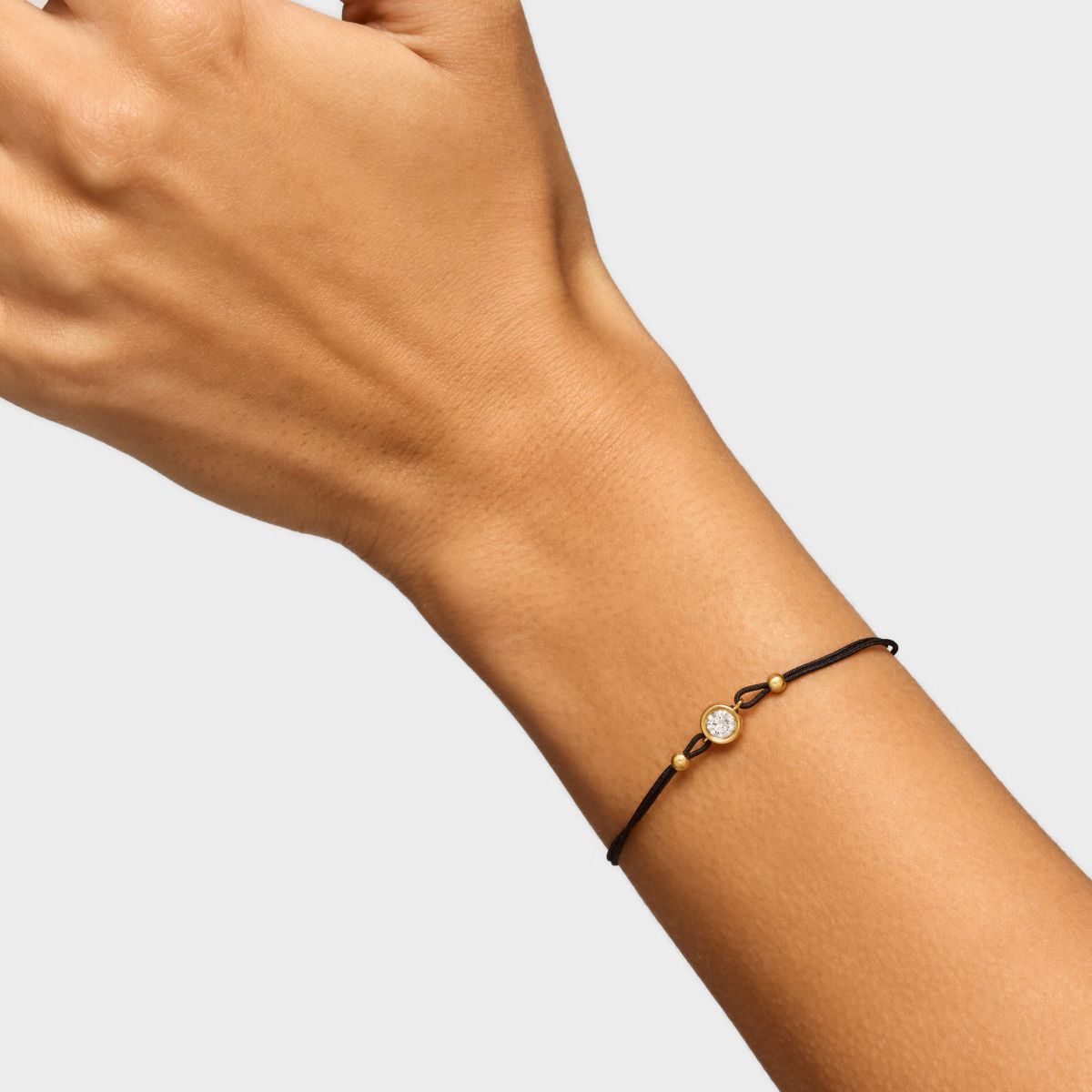 Pulsera de nylon negro con baño de oro 18 kt sobre plata y diamante creado en laboratorio Line LGD de Tous