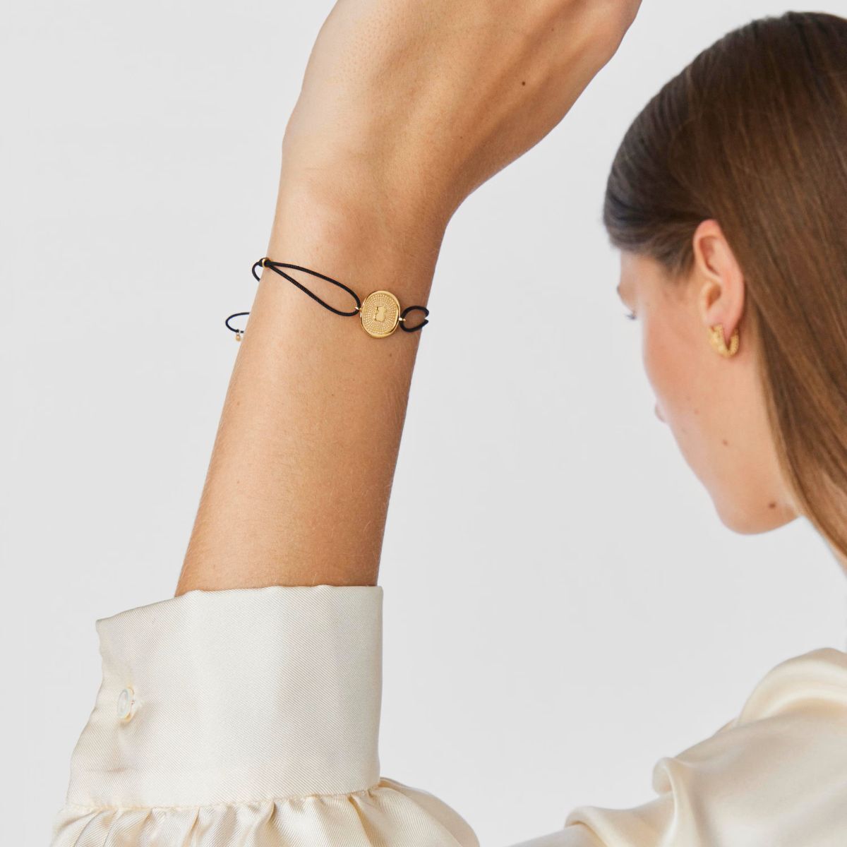 Pulsera de nylon y oro Oursin de Tous