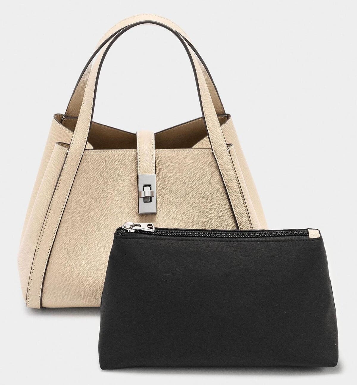 Bolso de mano estilo tote convertible a bandolera con cierre de botón en liso