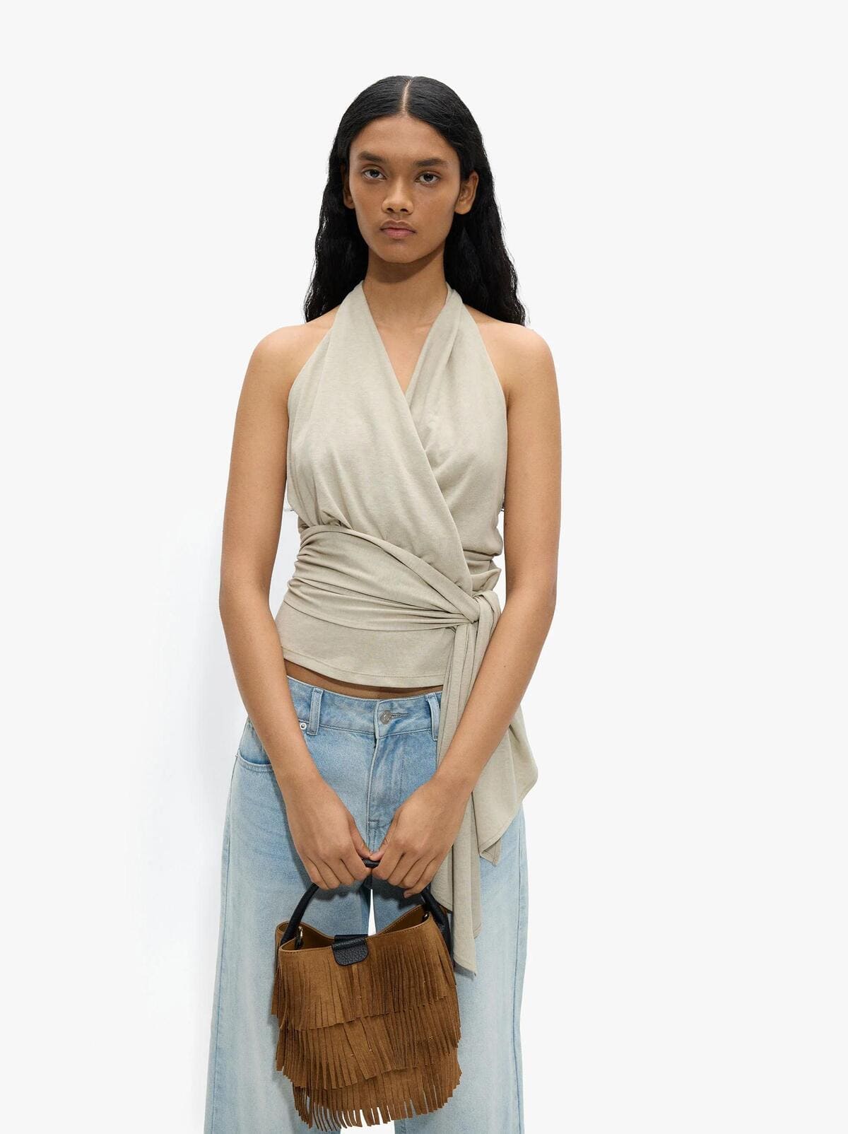 Bolso de mano bombonera con flecos