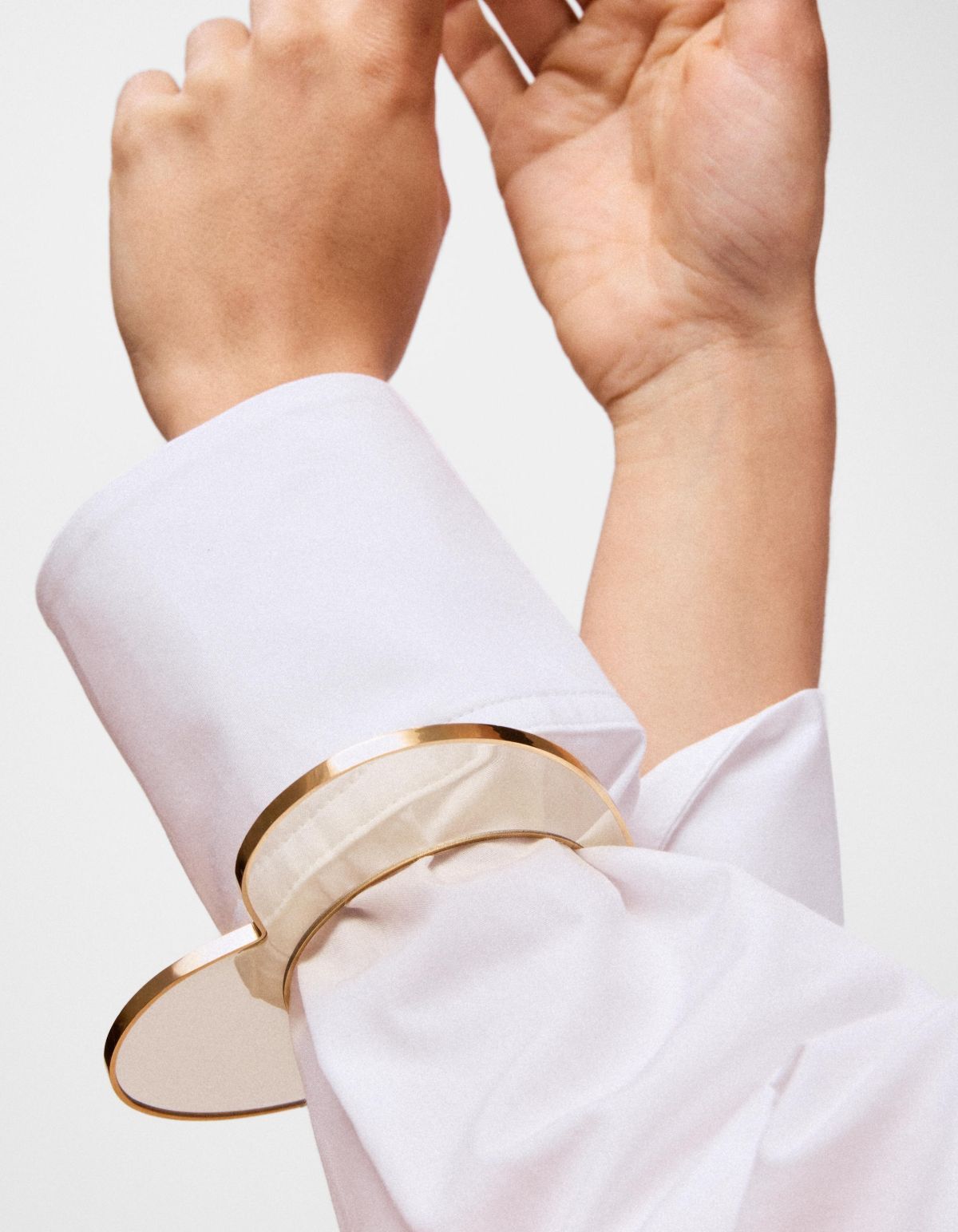 Pulsera esclava corazón de acero dorado y resina blanca Galaxy de Tous