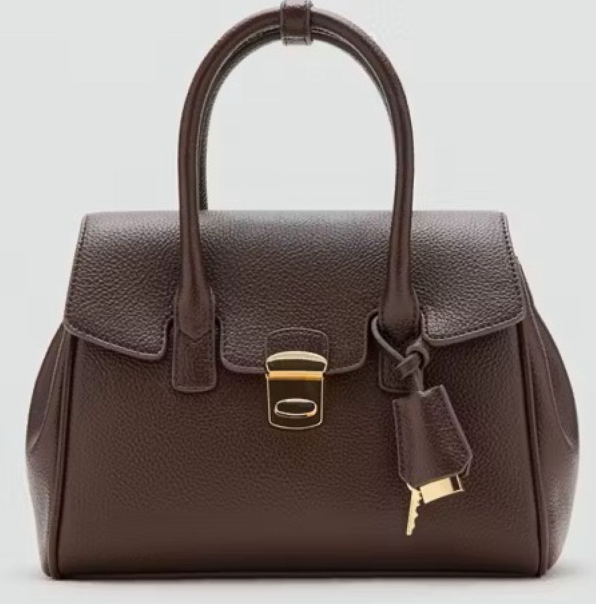 Bolso city solapa tamaño medio de Mango