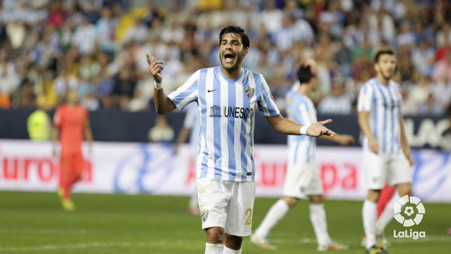 Miguel Torres durante un partido con el Málaga CF