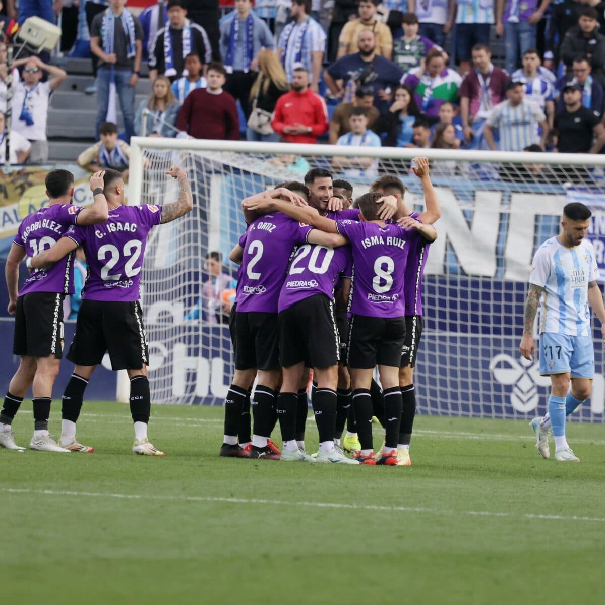 El Córdoba CF celebrando su victoria ante el Málaga CF en La Rosaleda